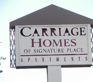 Carriage Homes of Signature Place Apartment Community Sign