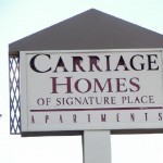 Carriage Homes of Signature Place Apartment Community Sign